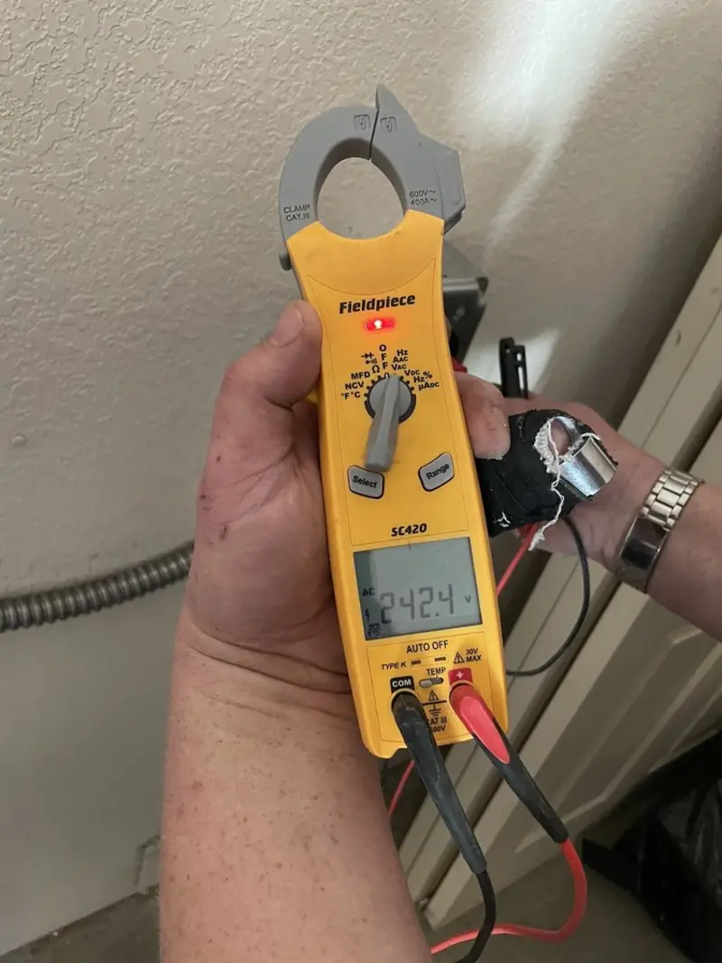 Voltage testing with clamp meter during Generator Installation in Lakeway